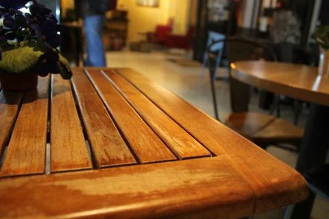 Bar table with violets Stock Photos