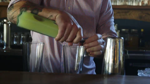 Bar Tender pours a drink Stock Footage 34683729