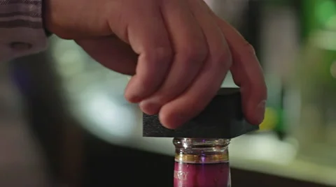 Bar Tender Unscrews &amp; Opens a bottle of Alcohol Video stock 40271735