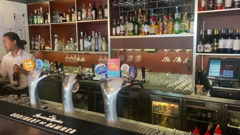 Bar tender video preparing mocktail &amp; cocktail at Bar Stock Footage 219726831