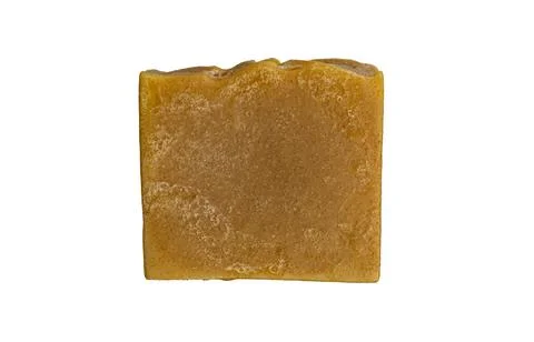 Bar of vegetable soap on a white background close up Stock Photos