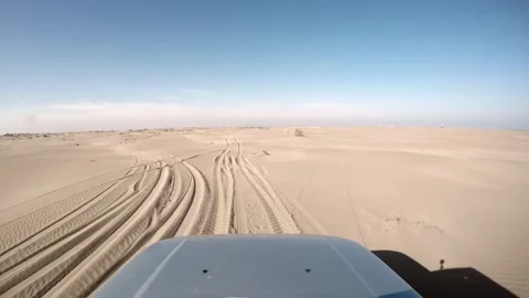 Baraawe Somalia sandy track shows vehicle stuck near coastal dunes and ground Stock Footage 339390156