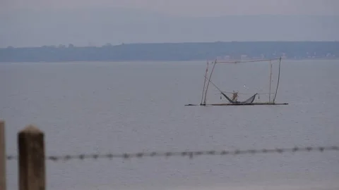 Barb wire with Beautiful blurry scene of water surface background, nice scene Stock Footage 151894446
