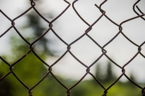 A barb wire fence pattern Stock Photos