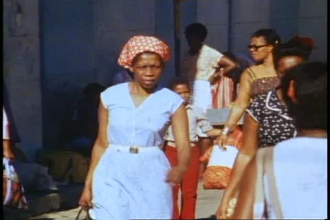 BARBADOS, 1982, medium close up young black girl walks by Stock Footage 11151914