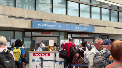 Barbados Airport Passport Control Queue for Departure Processing Stock Footage 328618136