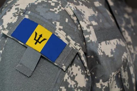 Barbados army uniform patch flag on soldiers arm. Military Concept Stock Illustration