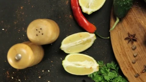 Barbecue and vegetables on a black table Top. Slide. Slow motion Stock Footage 81713335