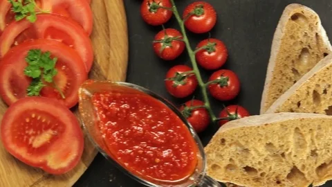 Barbecue and vegetables on a black table Top. Slide. Slow motion Stock Footage 81713351
