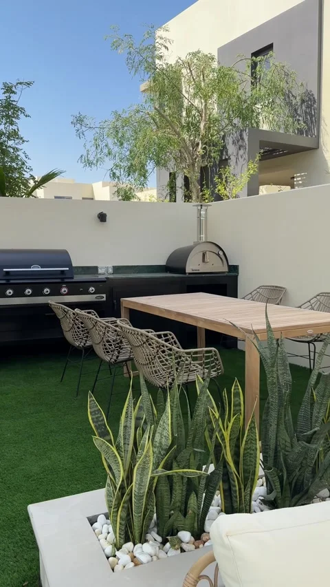 Barbecue in the backyard of a wealthy private villa in Dubai Stock Footage 308286324