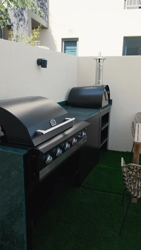 Barbecue in the backyard of a wealthy private villa in Dubai Stock Footage 308352123