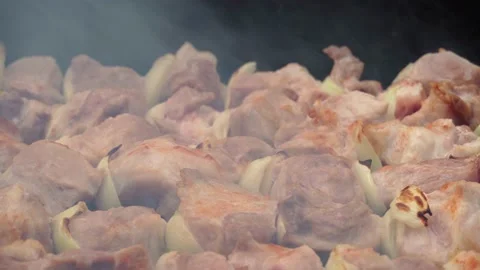 Barbecue closeup, meat roasted on the fire Stock Footage 131434751