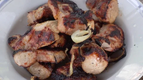 Barbecue cooked on an open fire with a Golden crust Stock Footage 89970745