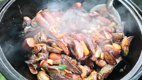 Barbecue. Cooking in a cauldron. Stock Footage 283580503