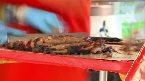Barbecue cutting fast motion blur Stock Footage 163482335