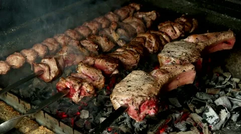 Barbecue with different kinds of meat on the grill Stock Footage 59186014