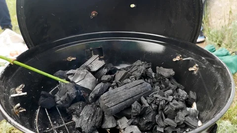 Barbecue grill. Close-up. Sometimes a man turns the meat on the grill. The conce Video stock 111021727