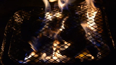 Barbecue grill with fire on the beach. 動画素材 96772357