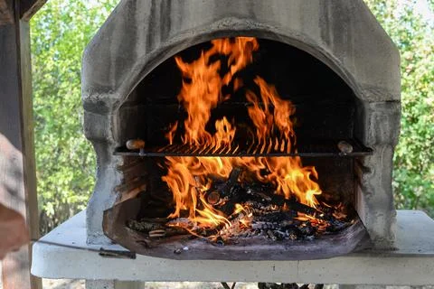 Barbecue grill with fire flames - Empty fire grid Stock Photos
