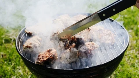 Barbecue Grill with Fire on Nature Stock Footage 107500624