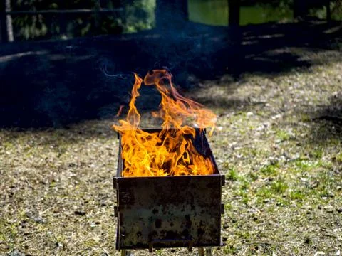 Barbecue grill with fire Stock Photos