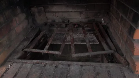 Barbecue grill metal rusty brick blackened broken abandoned Stock Footage 346224847