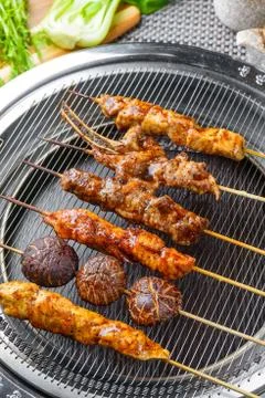 Barbecue on grill Stock Photos