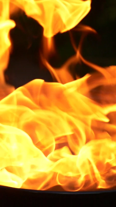 Barbecue grill, vertical slow motion burning fire flame, bbq picnic in backyard Stock Footage 267939865