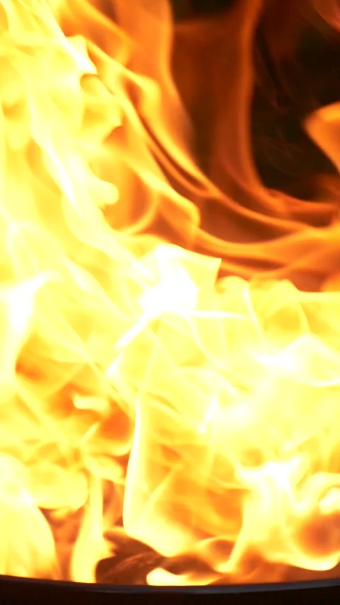 Barbecue grill, vertical slow motion burning fire flame, bbq picnic in backyard Stock Footage 273454701