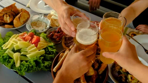 Barbecue meat and vegetables table food and beer friends. Selective focus. Stock Footage 244321941