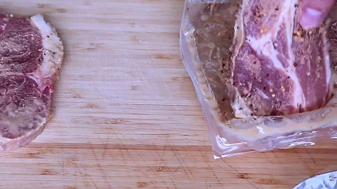 Barbecue Meat On A Cutting Board, Preparation For Grilling Close Up Steaks Stock Footage 240933989