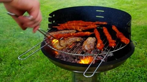 Barbecue, meat on the grill Stock Footage 52335192