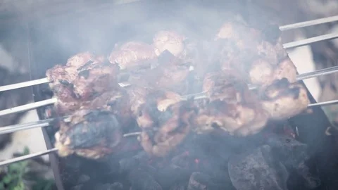 Barbecue of meat roasted on charcoal Stock Footage 75625409