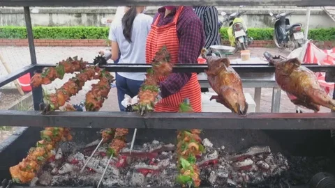 Barbecue at the roadside shop Stock Footage 70372162