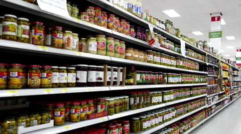Barbecue sauces corridor in Walmart store Stock Footage 62016385