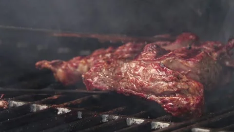 Barbecue steak fried on the grill Stock Footage 245477670