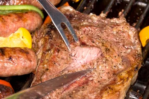 Barbecued steak Stock Photos