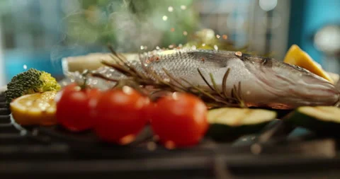 Barbecuing raw fish on grill Stock-Footage 311829079