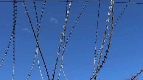 Barbed wire in Anamos prison Video stock 128639295