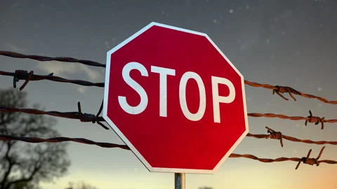 Barbed Wire and Stop Sign 2 Stock Footage 314016647