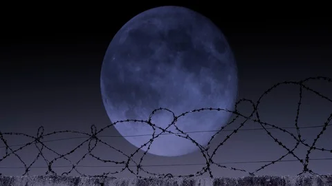 Barbed wire in the background of the moon 스톡 동영상 94054240