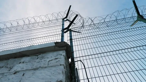 The barbed wire of the correctional facility Video stock 194951054