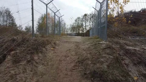 Barbed wire corridor Stock Footage 163610914