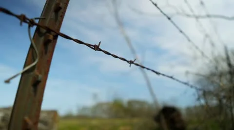 Barbed wire fence Stock Footage 22347598