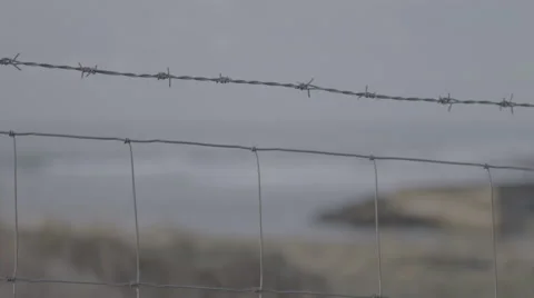 Barbed Wire fence Stock-Footage 62744332
