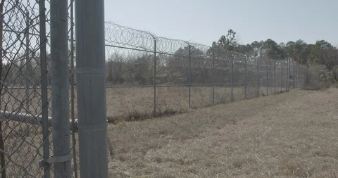 Barbed Wire Fence Stock Footage 124213827