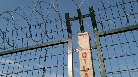 Barbed wire fence Video stock 272705399