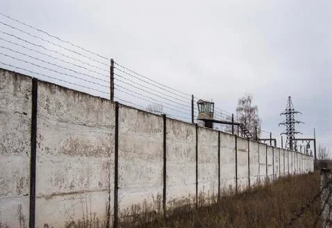 Barbed wire fence, maximum security prison Stock Photos