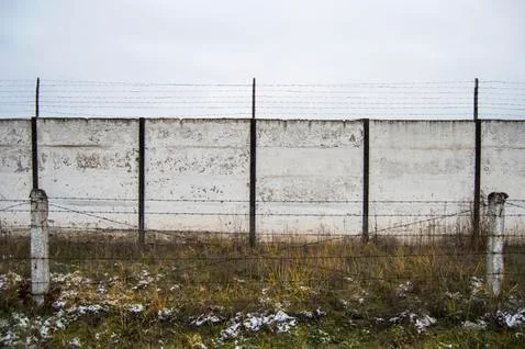 Barbed wire fence, maximum security prison Stock Photos