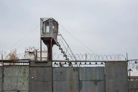Barbed wire fence, maximum security prison Stock Photos